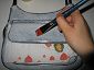 Colla decoupage su fronte borsa