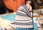 Porta tabacchi in jeans cucita