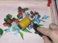 Pressare con rullo le immagini incollate